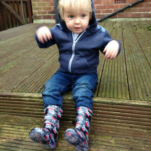 Oscar loves his wellies