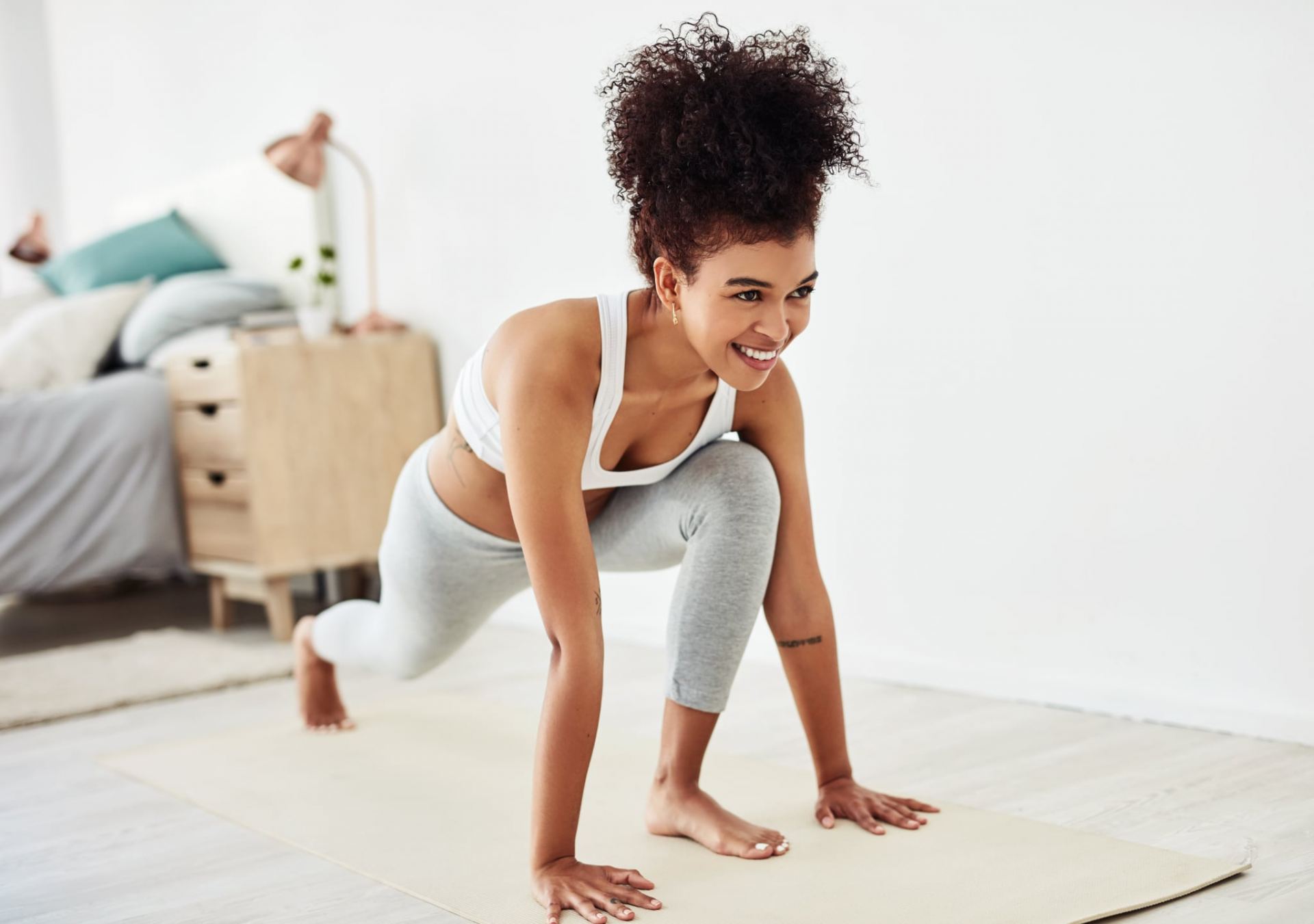 Young woman keeping fit at home Young woman keeping fit at home
